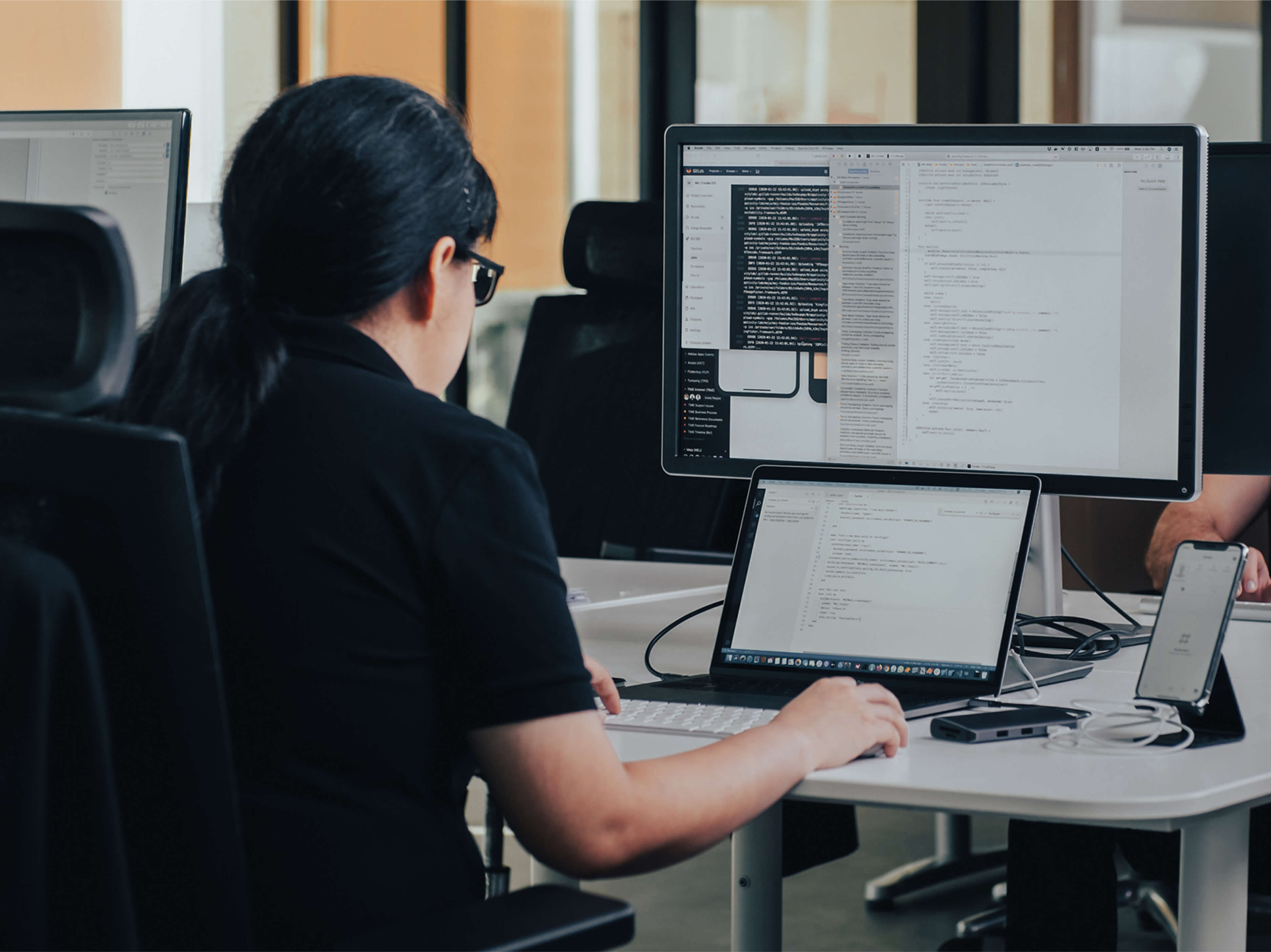 Smart Female Programmer Working on Solving Problem